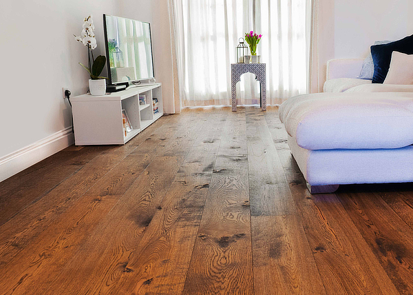 Herringbone wood floor in kitchen with green decor